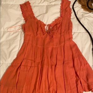 Barely warn Peach colored girly lace romper